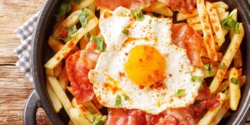 Ovos rotos com presunto