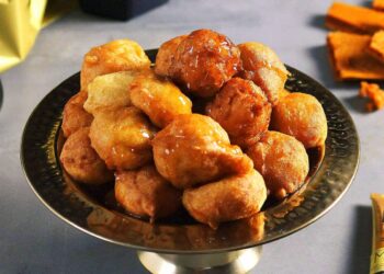 Sonhos de Natal com calda de laranja