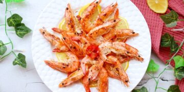 Camarões fritos com alho e cerveja