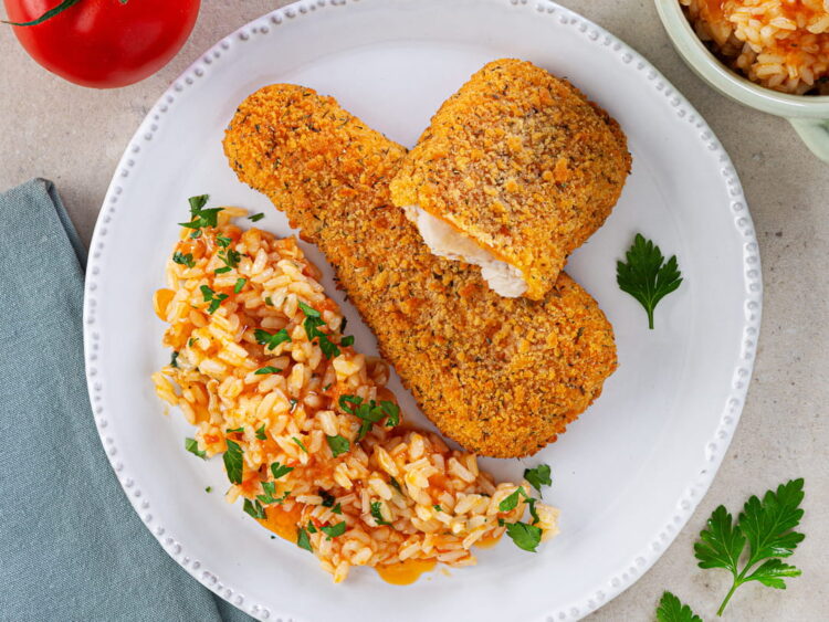 Filetes de pescada com arroz de tomate